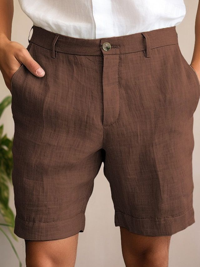 Chique herenshorts voor de zomer in zwart, met knoopsluiting en ademend materiaal voor een verfijnde uitstraling.