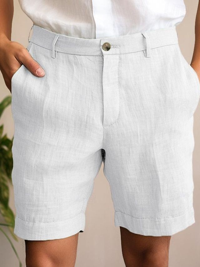 Chique herenshorts voor de zomer in zwart, met knoopsluiting en ademend materiaal voor een verfijnde uitstraling.