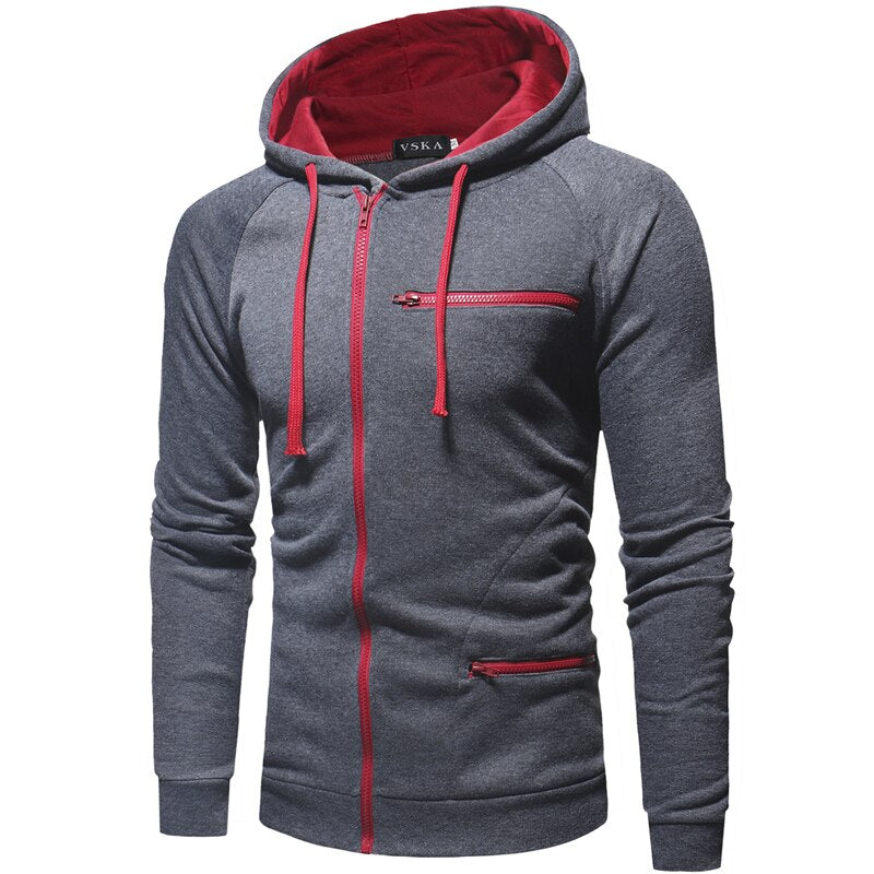 Grijze zip-up hoodie met rode accenten, ontworpen voor moderne mannen, perfect voor casual en sportieve outfits.






