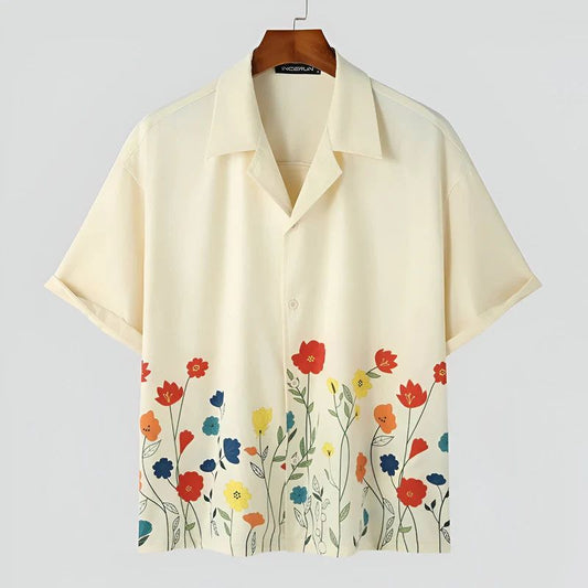 Stijlvol crèmekleurig herenoverhemd met kleurrijke bloemenprint, perfect voor de zomer.