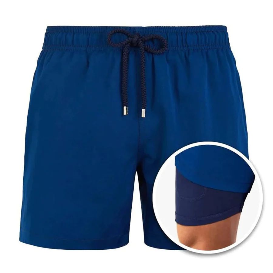 Trendy zwemshorts voor heren met tropisch bladmotief, perfect voor zomerse strand- en wateractiviteiten.