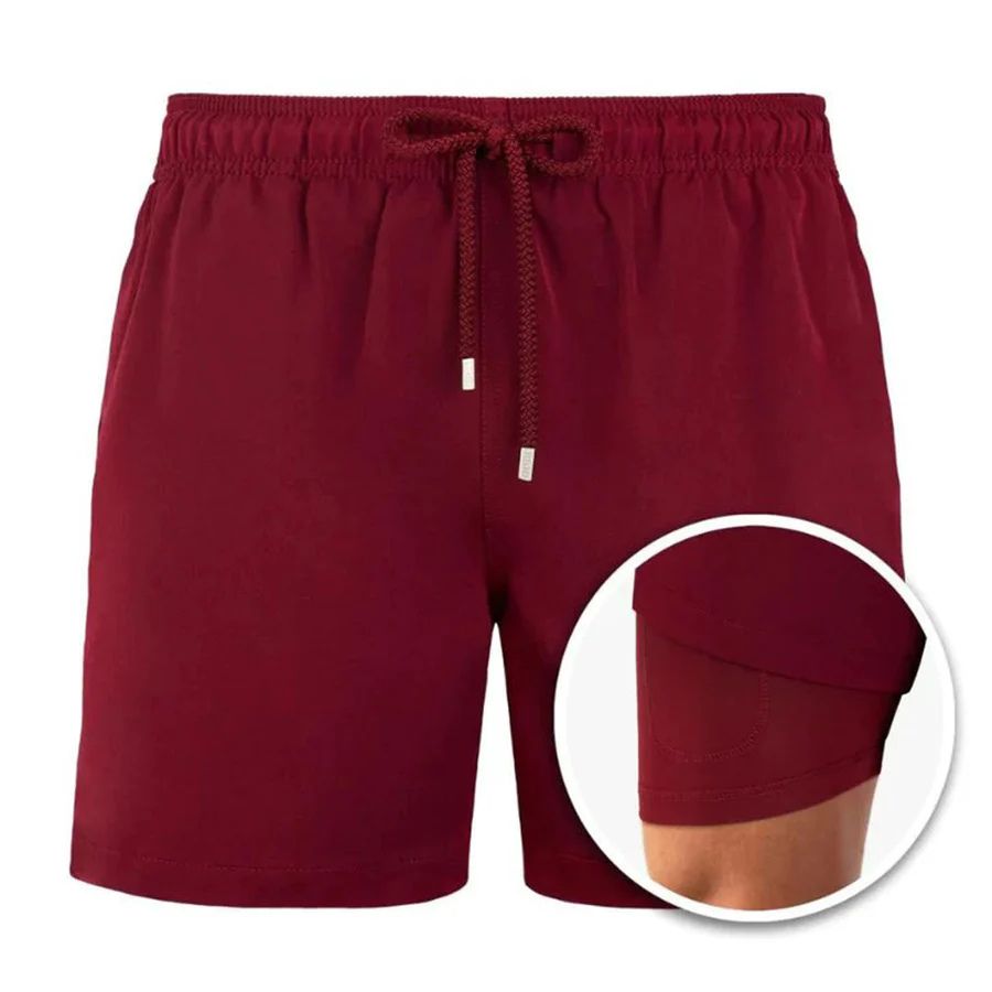 Trendy zwemshorts voor heren met tropisch bladmotief, perfect voor zomerse strand- en wateractiviteiten.