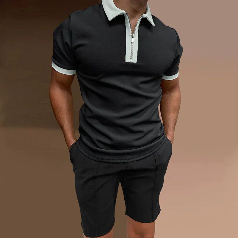 Moderne zomerset voor heren met een stijlvolle half-zip polo en comfortabele shorts, ideaal voor casual en chique gelegenheden.