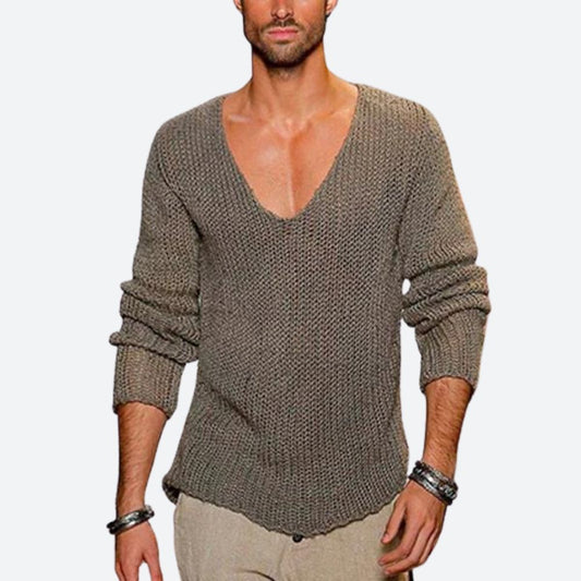 Stijlvolle trui voor mannen met een diepe V-hals en moderne gebreide textuur, perfect voor casual herfst- en winterdagen.